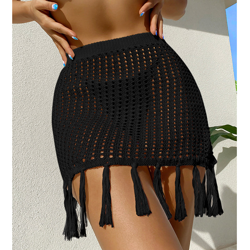 Vacaciones sexys Vacío Transparente Protección solar Vestido de punto Falda con borlas Pareo de playa Ganchillo