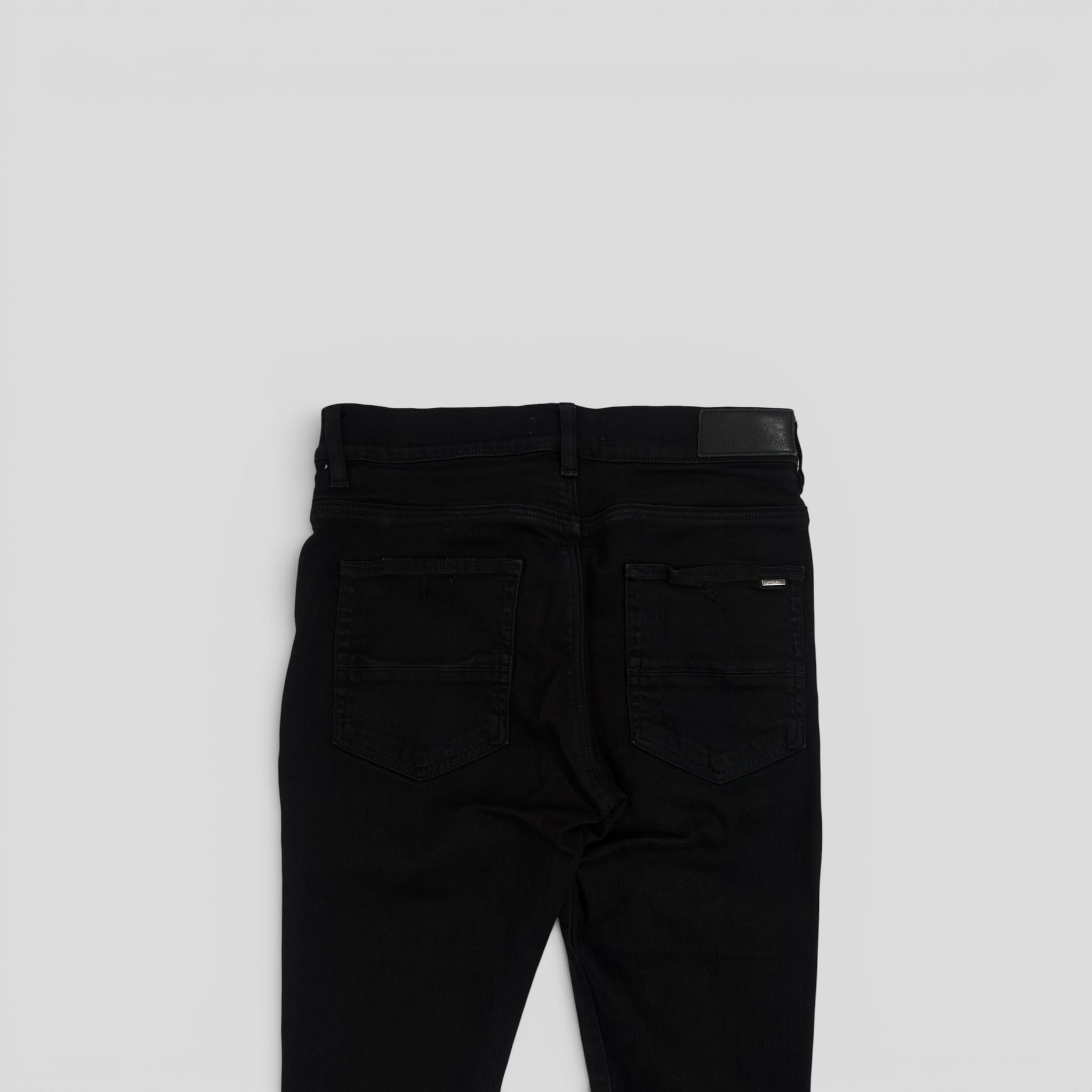 Amiri MX1 Aloha Patch Jeans en negro