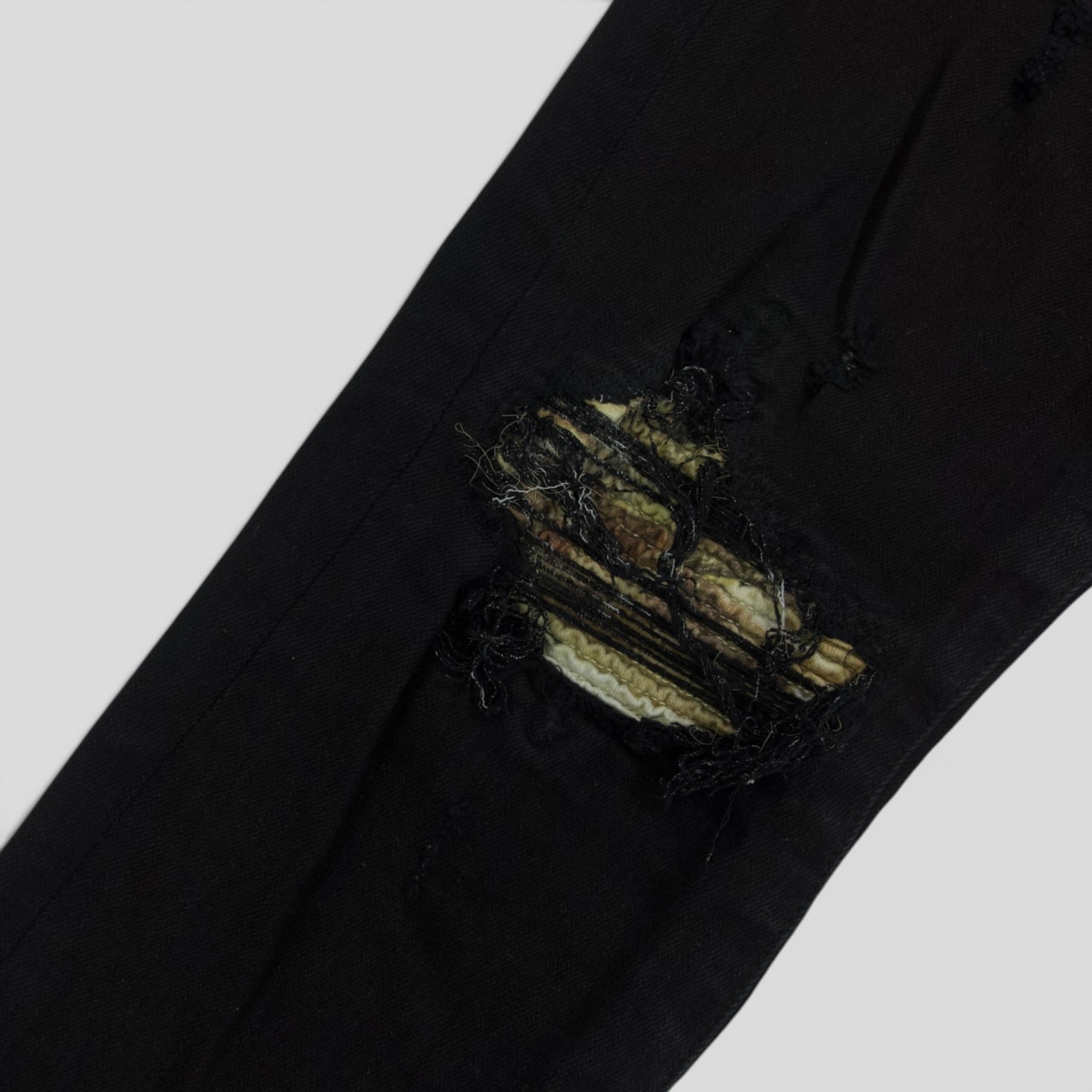 Amiri MX1 Aloha Patch Jeans en negro
