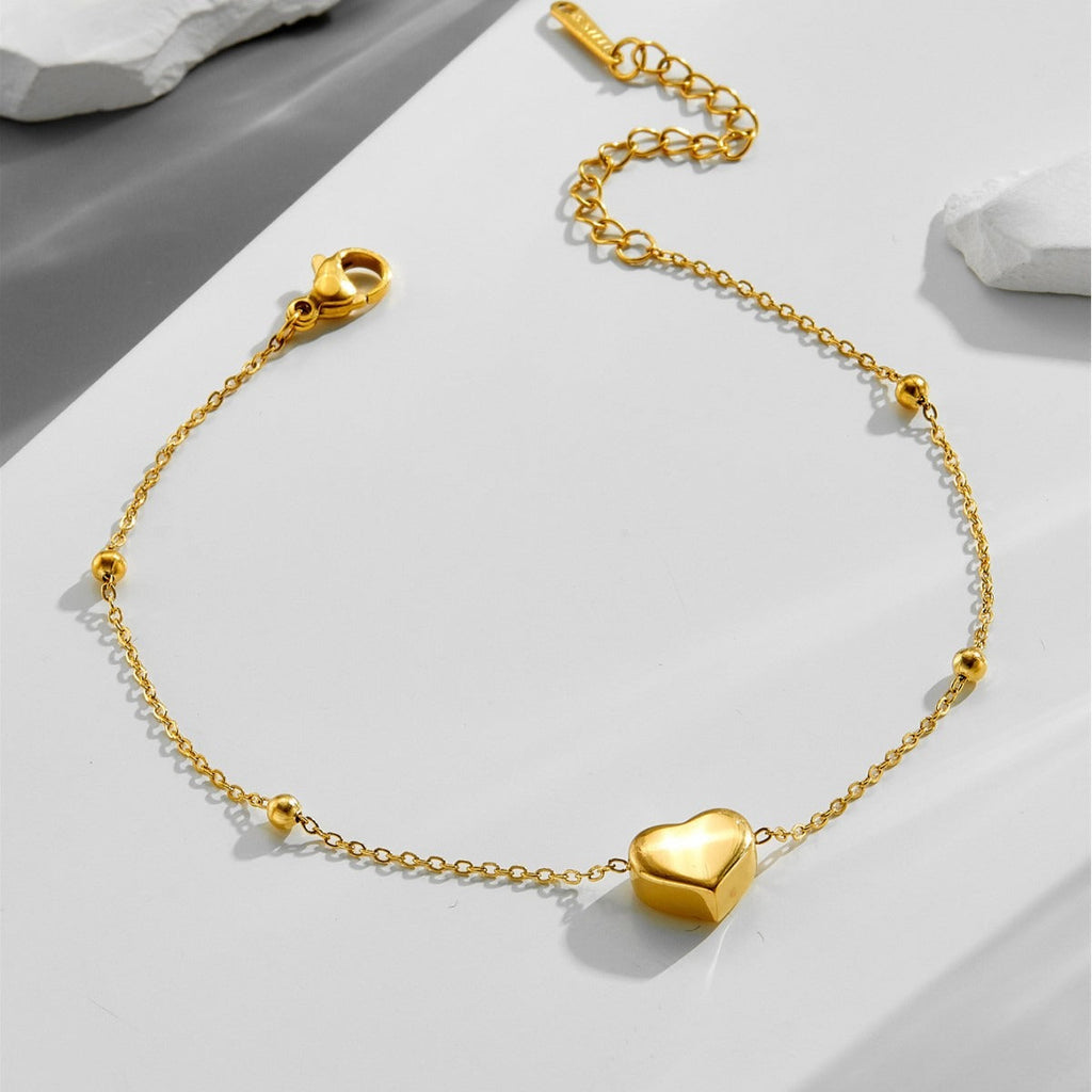 Tobillera de Corazón 3D de Acero de Titanio con Oro de 18k