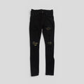 Amiri MX1 Aloha Patch Jeans en negro
