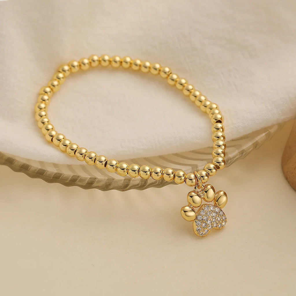 NEWBUY Pulseras de Cuentas con Dije de Pata de Zirconia Cúbica AAA de Cobre de Color Oro Inoxidable para Fiesta para Mujeres