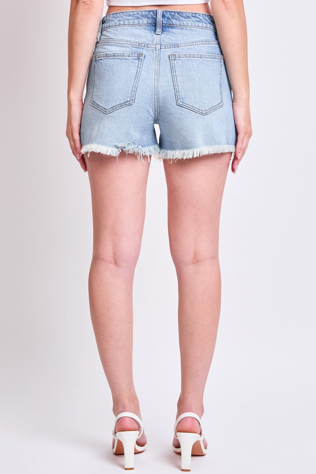 Shorts de tiro alto con bajo deshilachado para mujer