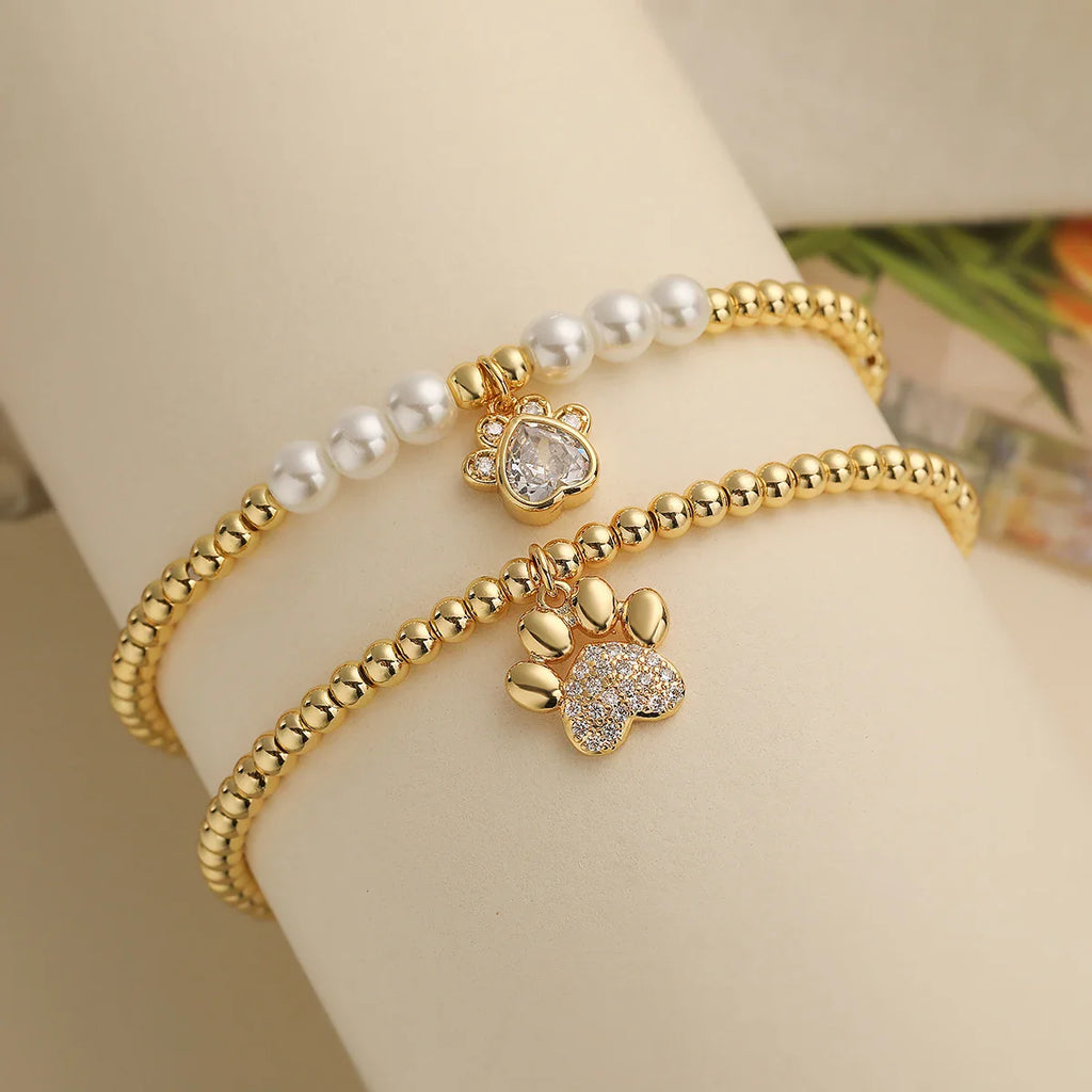 NEWBUY Pulseras de Cuentas con Dije de Pata de Zirconia Cúbica AAA de Cobre de Color Oro Inoxidable para Fiesta para Mujeres