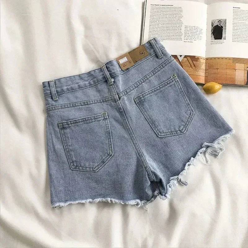 Pantalones cortos de mezclilla coreanos con agujeros para mujer, shorts de mezclilla de cintura alta y pierna ancha, ropa de calle informal de diseñador para mujer 2024 Novedad