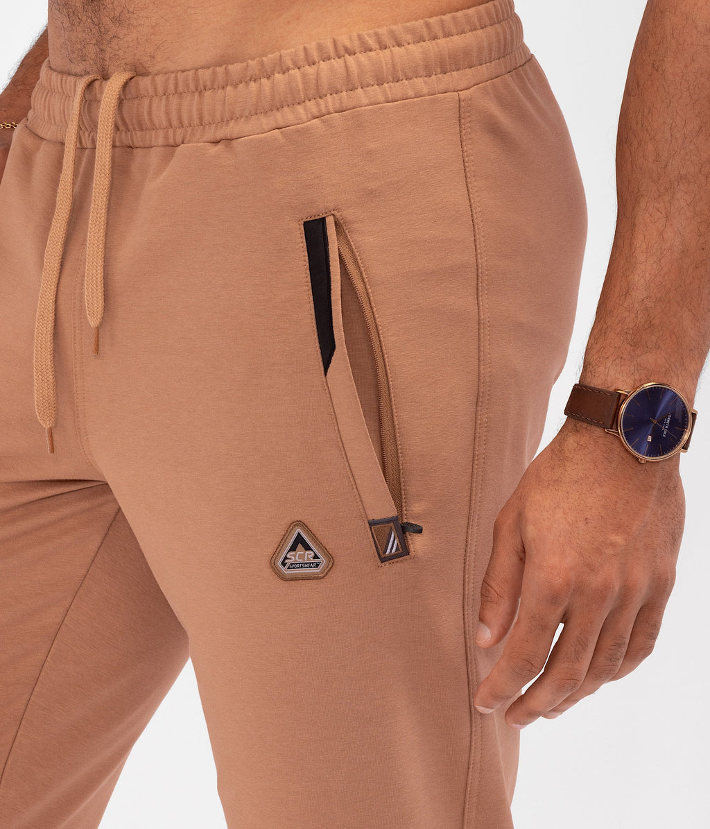 Pantalones de chándal deportivos cómodos para todo el día - Con forma cónica (Talla alta)