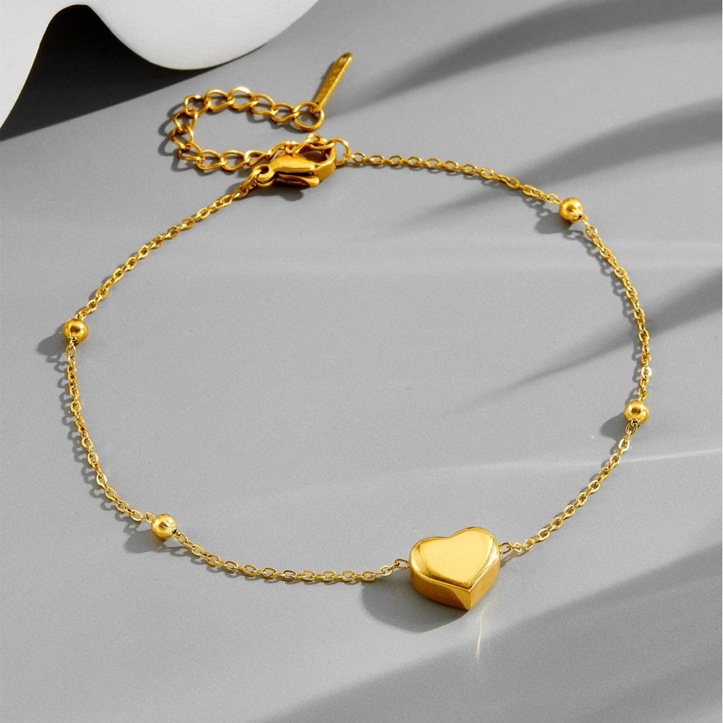 Tobillera de Corazón 3D de Acero de Titanio con Oro de 18k